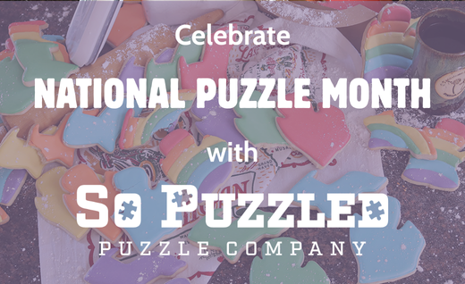 A picture of the Oh My Cookies! Puzzle with multicolored Michigan shaped cookies on a towel with a rolling pin. The overlay text says Celebrate National Puzzle Month with So Puzzled Puzzle Company